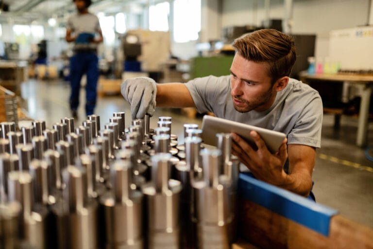 a worker is doing quality control and assurance process