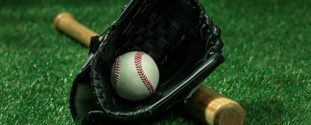 Close-up of a baseball in a glove