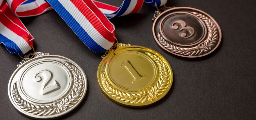 Custom metals medal trio: gold