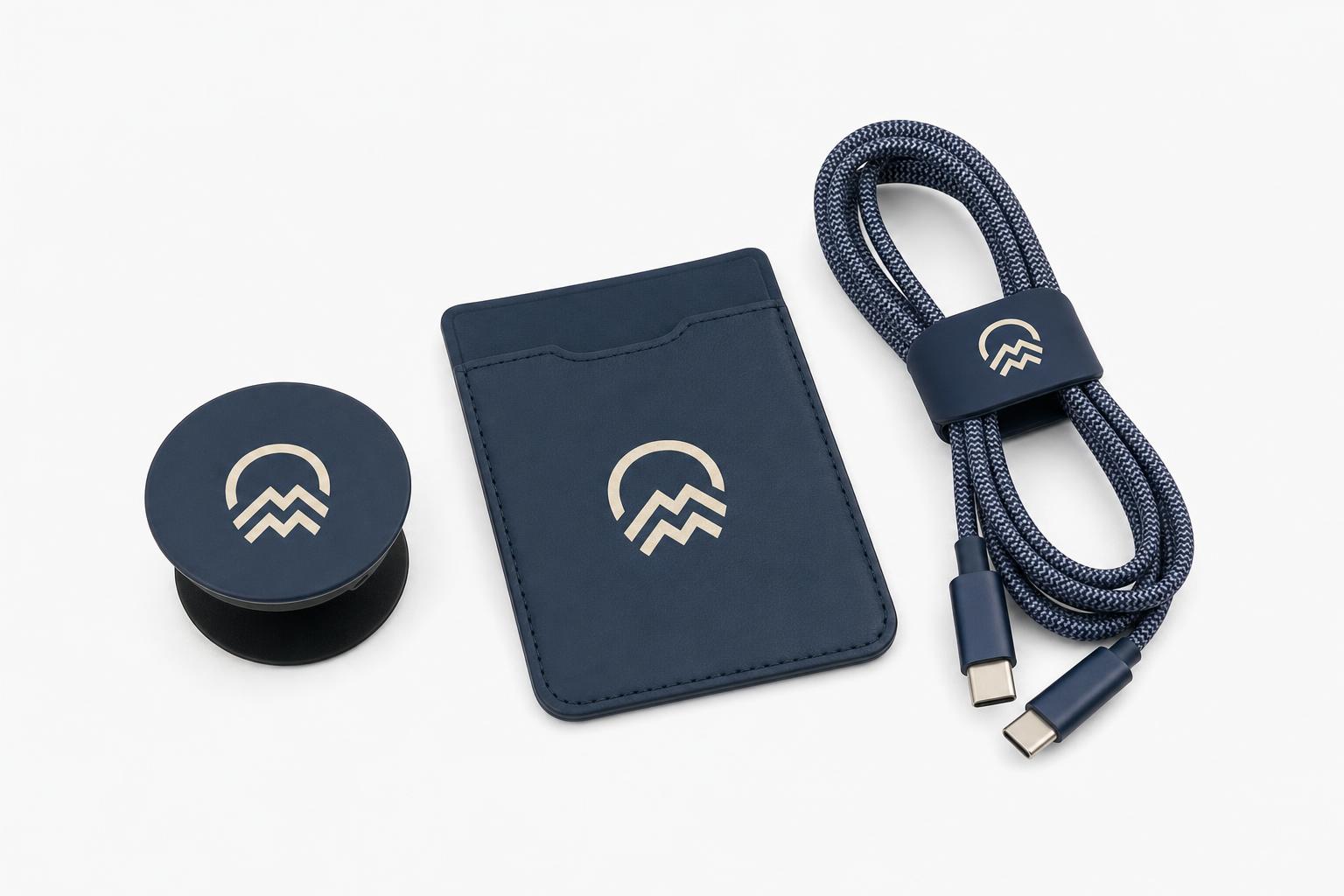 Custom branded phone grip, card wallet and charging cable with a printed logo.